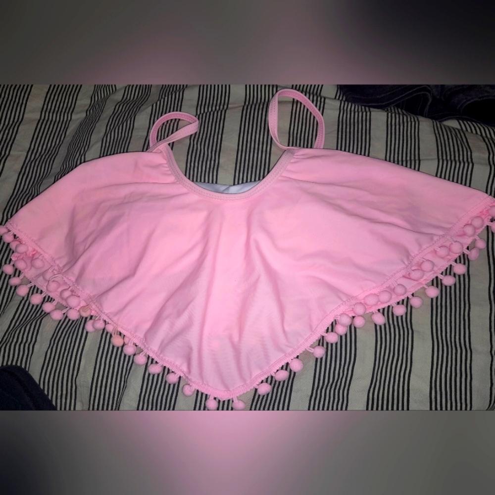 Pink Flounce swimsuit crop top.